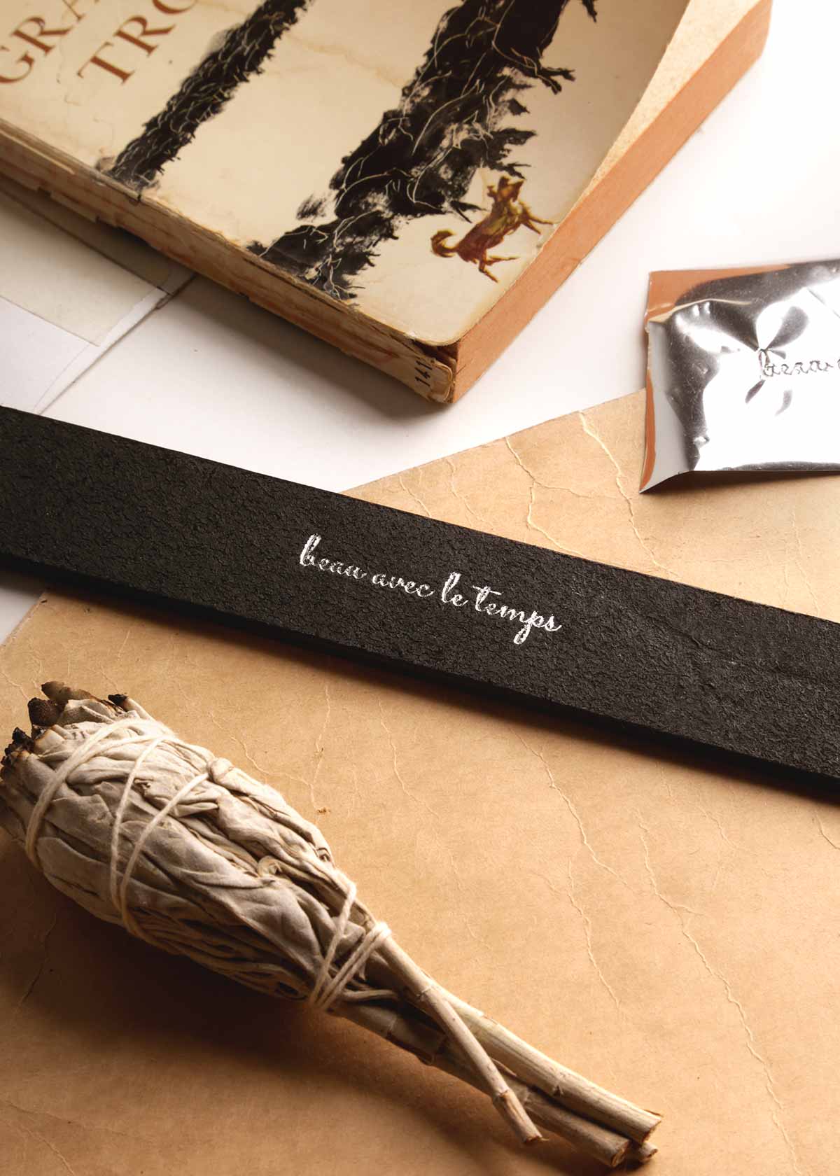 1.25" black belt hot stamped at the back